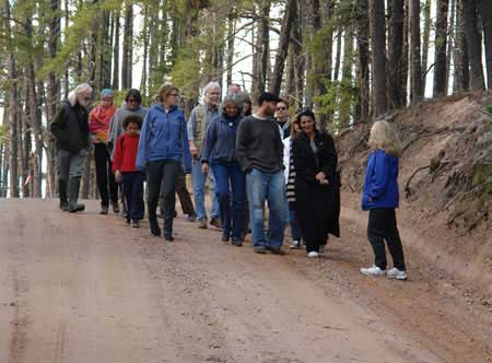 Lois Gibbs with concerned citizens from Marquette County near the gates of Eagle Mine in Powel Township